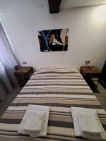 Alloggiamo - Ferienwohnung