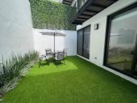 Excelente departamento c/jardín. - Ferienwohnung
