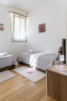 Camera Deluxe Doppia con Letti Singoli