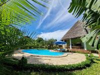 B&B Diani Beach - Paradiesische Villa Maisha Mazuri mit Pool. Terrasse und Personal - Bed and Breakfast Diani Beach