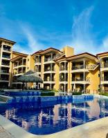 Apartamento de Lujo en Playa Jacó, Frente al Mar, Wifi, AC, Parqueo Privado y Piscinas - Chambres d'hôtes Jacó