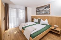 B&B Lutago - Zum Sonnentor App Larix - Bed and Breakfast Lutago