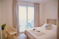 Doppel-/Zweibettzimmer mit Balkon