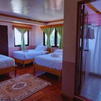 Chambre Triple avec Terrasse