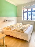 En lille hel lejlighed i midtbyen - centralt, hyggelig og tæt på alt! - B&B