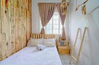 Camera Doppia con Letti Singoli e Bagno in Comune