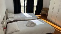 Tweepersoonskamer met 1 of 2 Bedden en Gedeelde Badkamer