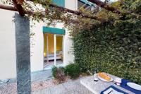 Casa delle Vigne: Giardino, pergola e vista lago - Chambres d’hôtes Minusio