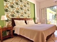 Camera Tripla con Vista Giardino