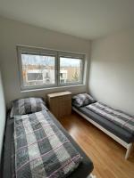 Tweepersoonskamer met 2 Aparte Bedden en een Terras