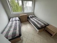 Tweepersoonskamer met 2 Aparte Bedden