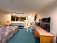 Zimmer mit Kingsize-Bett und Whirlpool