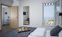 One-Bedroom Apartment with Balcony and Sea View