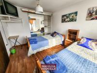 Tweepersoonskamer met 2 Aparte Bedden en Eigen Externe Badkamer