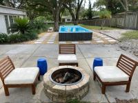 Reel relaxing across from River in Huge 24 foot Swim Spa - B&B Tampa