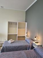 Kleine Tweepersoonskamer met 2 Aparte Bedden