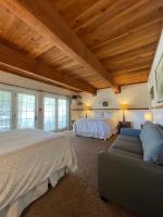 Deluxe Queen Room with Two Queen Beds and Private Bathroom