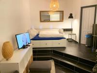 Apartment mit 1 Schlafzimmer und Dusche (über dem Musikclub)