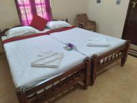 Chambre Double Deluxe (2 Adultes + 1 Enfant)