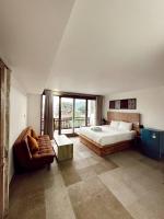 Chambre Double Deluxe - Vue Latérale sur Mer