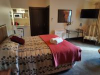 Suite con cama extragrande