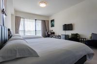 Camera Quadrupla con Vista Giardino 