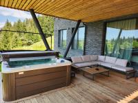 Four-Bedroom Chalet with Jacuzzi
