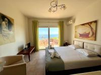 One-Bedroom Apartment with Sea View