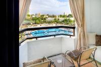 Executive Suite, 1 King, Sofa bed, Garden & Pool view