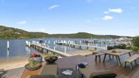 Riptides Booker Bay -Waterfront apartment, walk to shops & cafes - Chambres d’hôtes