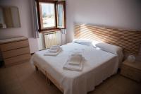 Tweepersoonskamer met 1 of 2 Bedden en Gedeelde Badkamer