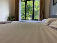 Chambre Triple - Vue sur Jardin