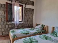 Camera Doppia con Letti Singoli