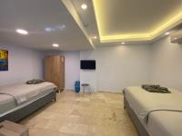 Chambre Quadruple avec Salle de Bains