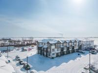 Family-ready townhome, garage parking and crib - Chambres d'hôtes Airdrie