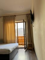 Doppelzimmer mit Balkon (2 Erwachsene + 1 Kind)