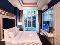 Grand Florida Beachfront Condo Resort Pattaya - B&B Ban Na Chom Thian