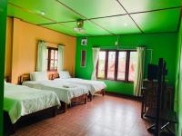Dreibettzimmer mit Bergblick