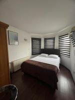 Deluxe Doppel-/Zweibettzimmer