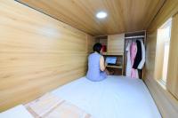 Cama en habitación compartida de 8 camas