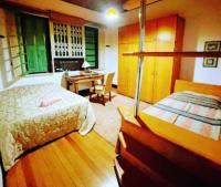 Camera Matrimoniale con Letto Supplementare