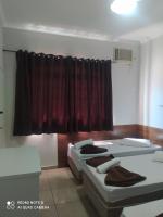 Pousada Quarto Familiar com ar,frigobar,wi fi, garagem - B&B