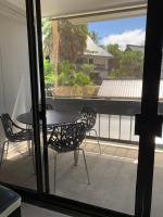 Lucy's Place -STUDIO Apt with air-conditioning, Murphy bed - Chambres d’hôtes Baie de Hilo