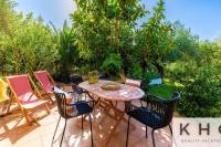 Théa Lassi 2 bedroom apartment, Garden level - Ferienwohnung
