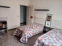 Camera Standard Doppia con Letti Singoli con Bagno in Comune