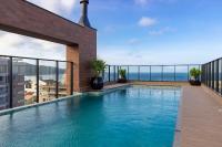 Villa Francione 302 – Loft de Alto Padrão com Piscina no Rooftop e Vista Panorâmica, a Poucos Metros do Mar em Bombas. - Ferienwohnung Bombinhas