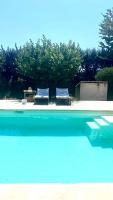 Charmante maisonnette avec jardin et piscine - Ferienwohnung