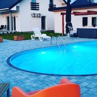 Apartamenty Wilga z całorocznym jacuzzi i letnim basenem - B&B