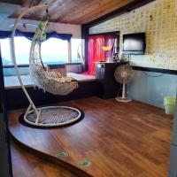 Habitación Doble Deluxe con vistas laterales al mar