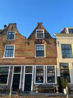 Cozy home with a view on the harbour - Bed and Breakfast Brielle
